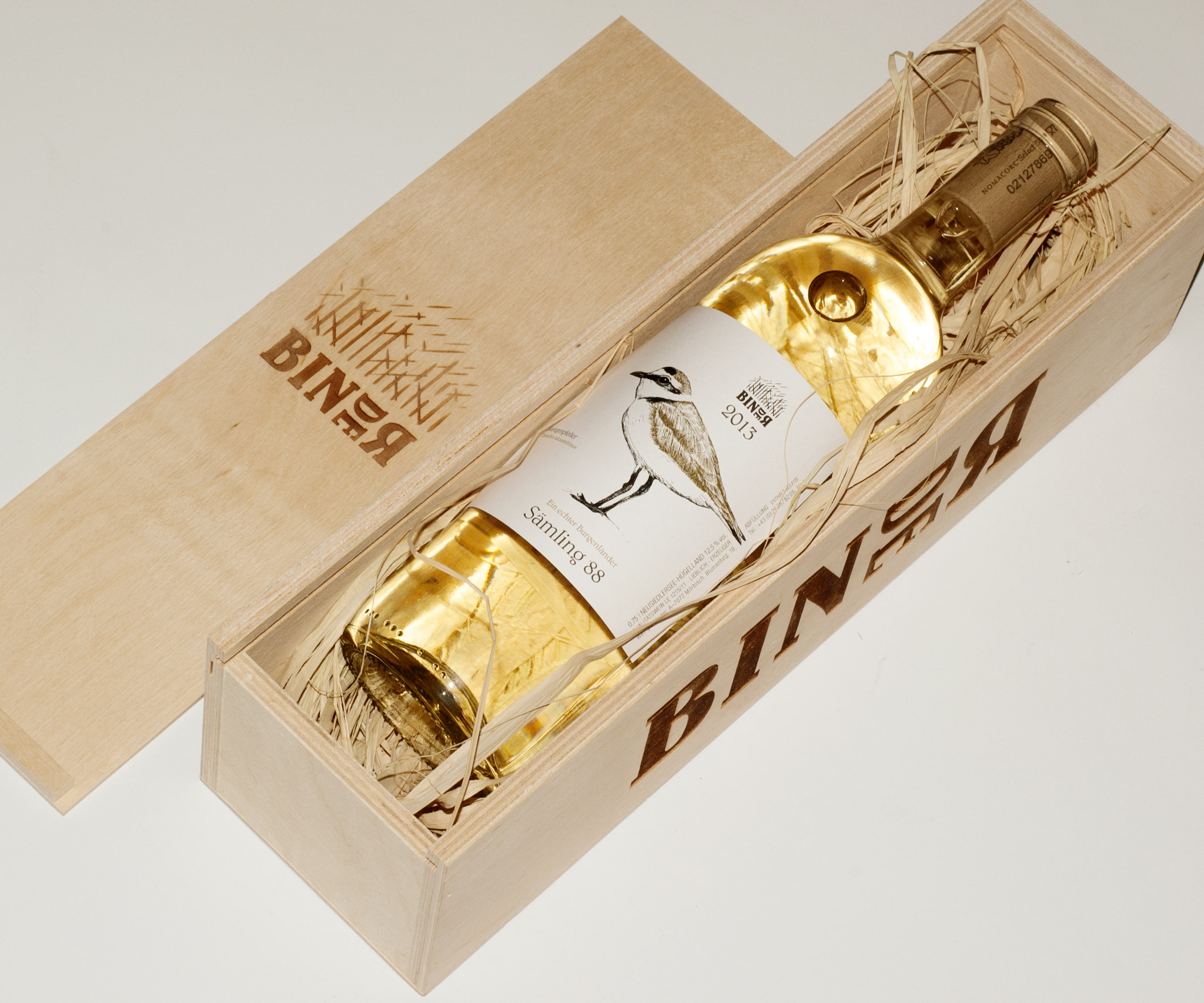 Binder whitewine in wooden box Bottle of Binder whitewine in a wooden box